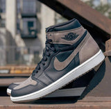 NIK.E AIR JORDAN RETRO 1 HIGH PALOMINO SEMI UA
