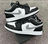 NIK.E AIR JORDAN 1 LOW PARTICLE GREY