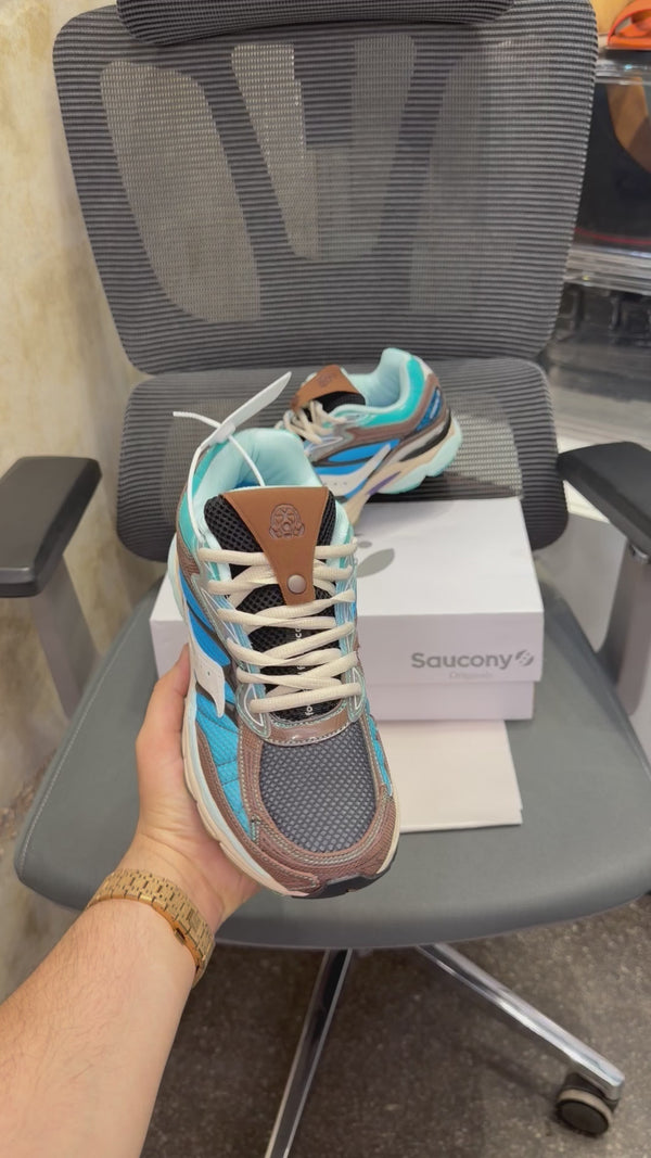 Footpatrol x Saucony ProGrid Omni 9 in the BlueBrown
